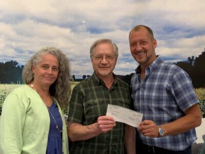 1st Selectman Patrick Roy awards RLT President John Smoliga and Director of Development Barbara Bradbury Pape AARPA Funds for Kiosk Improvements